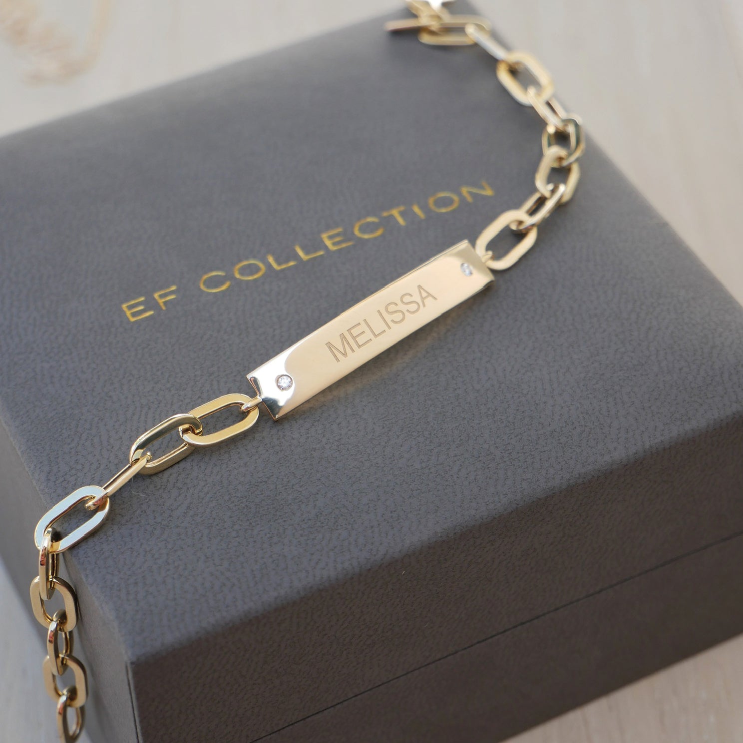 Nameplate Jumbo Link Bracelet in 14k yellow gold engraved with initials MELISSA