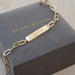 Nameplate Jumbo Link Bracelet in 14k yellow gold engraved with initials MELISSA