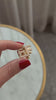 Diamond Bag Charm in 14k Yellow Gold with two letters suitable for handbag styles, in real life