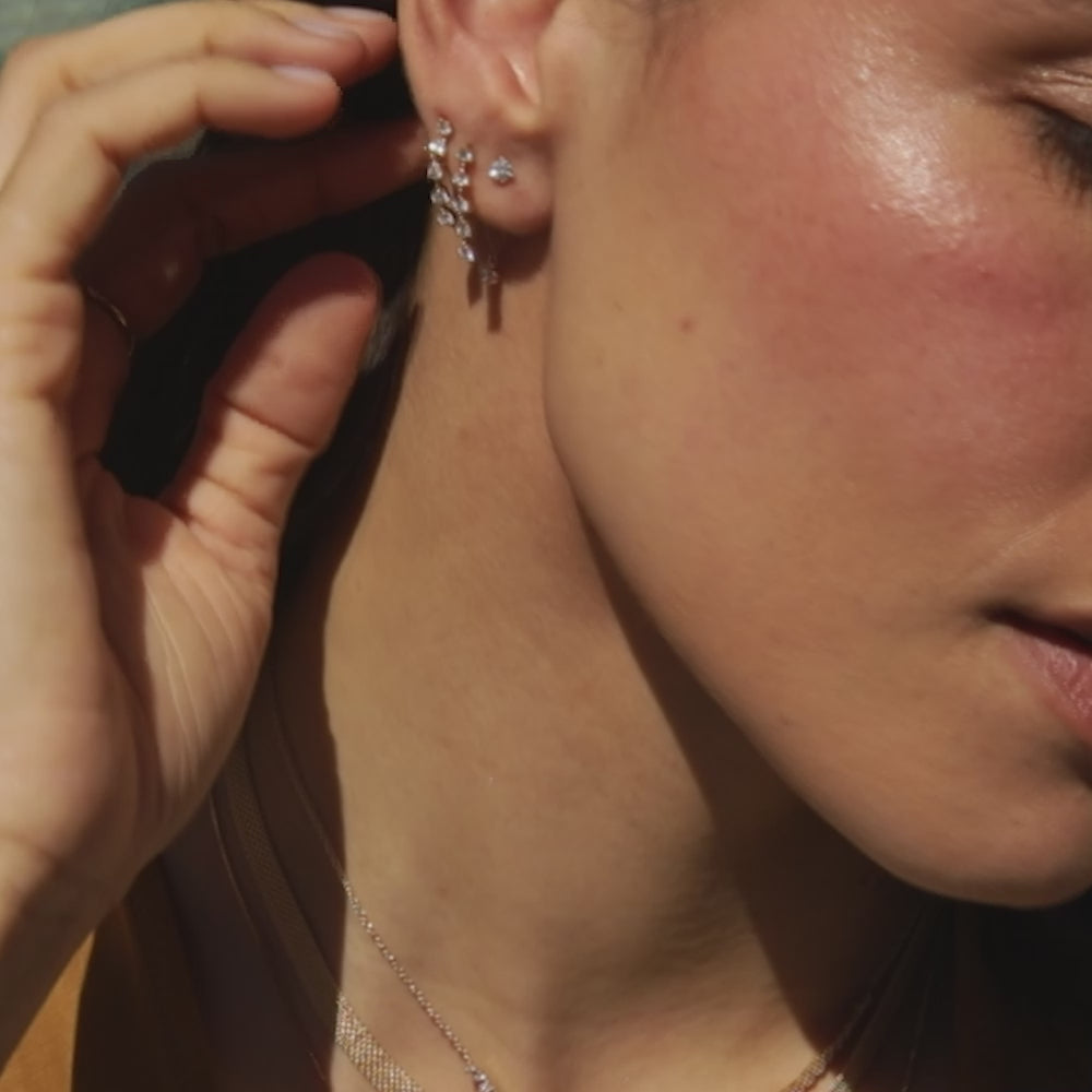 Diamond Bar Mesh Ring in 14k yellow gold styled on finger of model tucking hair behind ear with no model