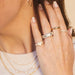 Diamond Heart Signet Ring in 14k Yellow Gold Styled on Pinky with Additional Rings and Necklaces Styled on Model