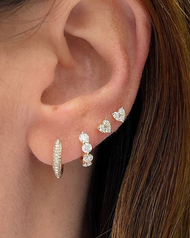 Full Cut Diamond Mini Heart Stud Earring in 14k yellow gold styled on ear of model