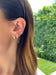 Triple Solitaire Chain Earring Styled On Ear