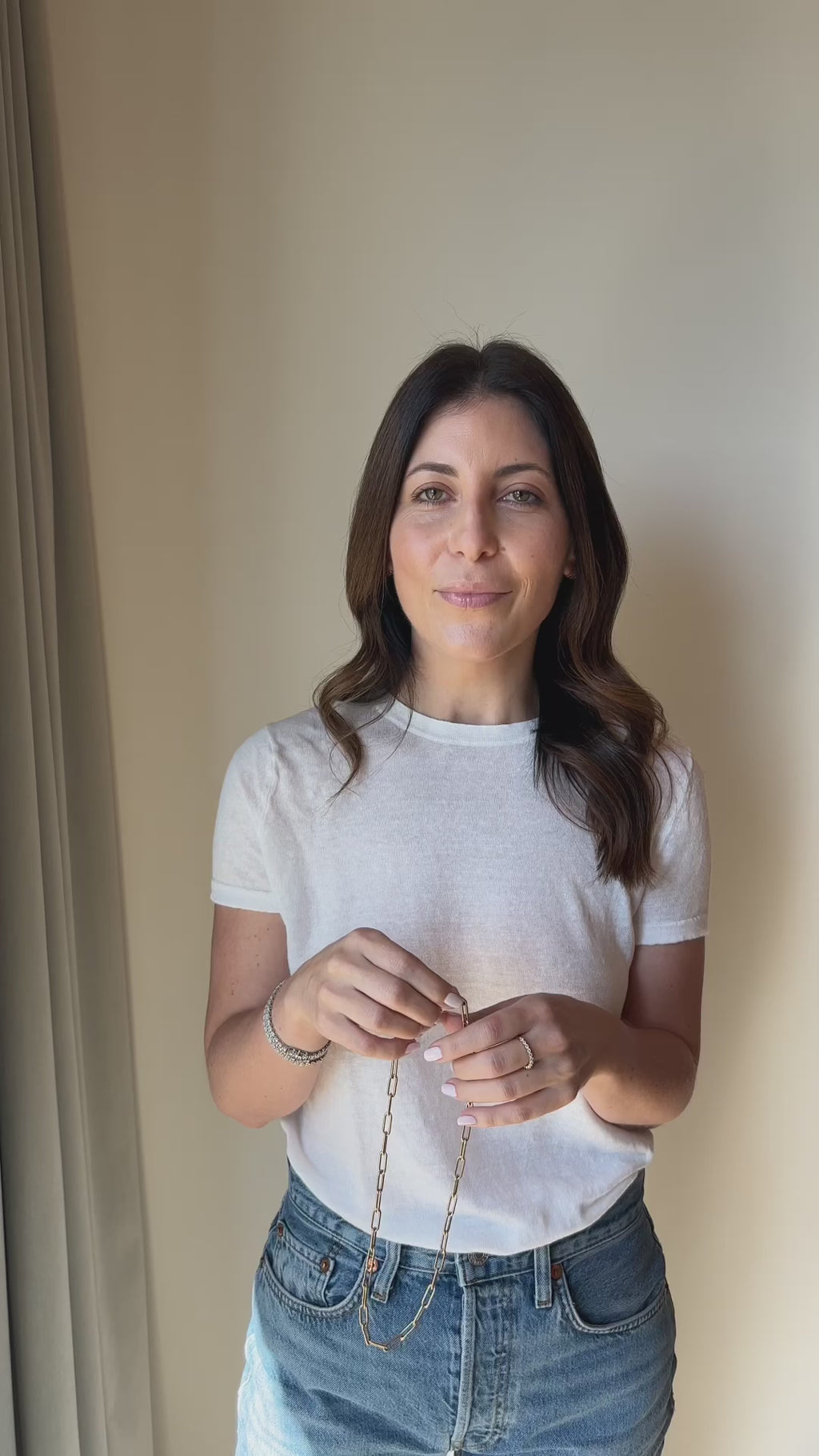 Video of Model Wearing the Jumbo Lola Chain Necklace And Triple Wrap Bracelet in 14k Yellow Gold on Necklace and Bracelet