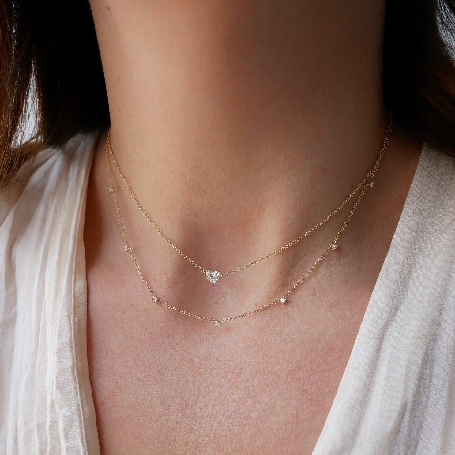 7 Prong Set Diamond Necklace in 14k yellow gold styled on neck of model