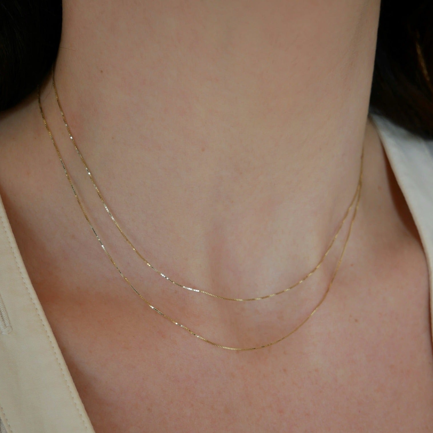 double Strand Liquid Gold Necklace on  the neck in yellow gold