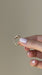Diamond Signet Ring in 14k yellow gold being held in hand of model then put onto pinky finger of model with no audio