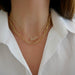 Jumbo Lola Chain Necklace on the neck in yellow gold