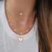Diamond & Red Enamel Heart Necklace styled on the neck shown with engraving