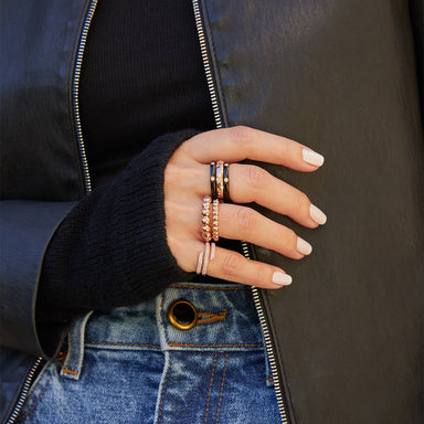 Black cashmere wrist warmer styled on the hand 