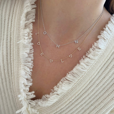 Love Around the Neck Necklace styled on the neck in yellow gold