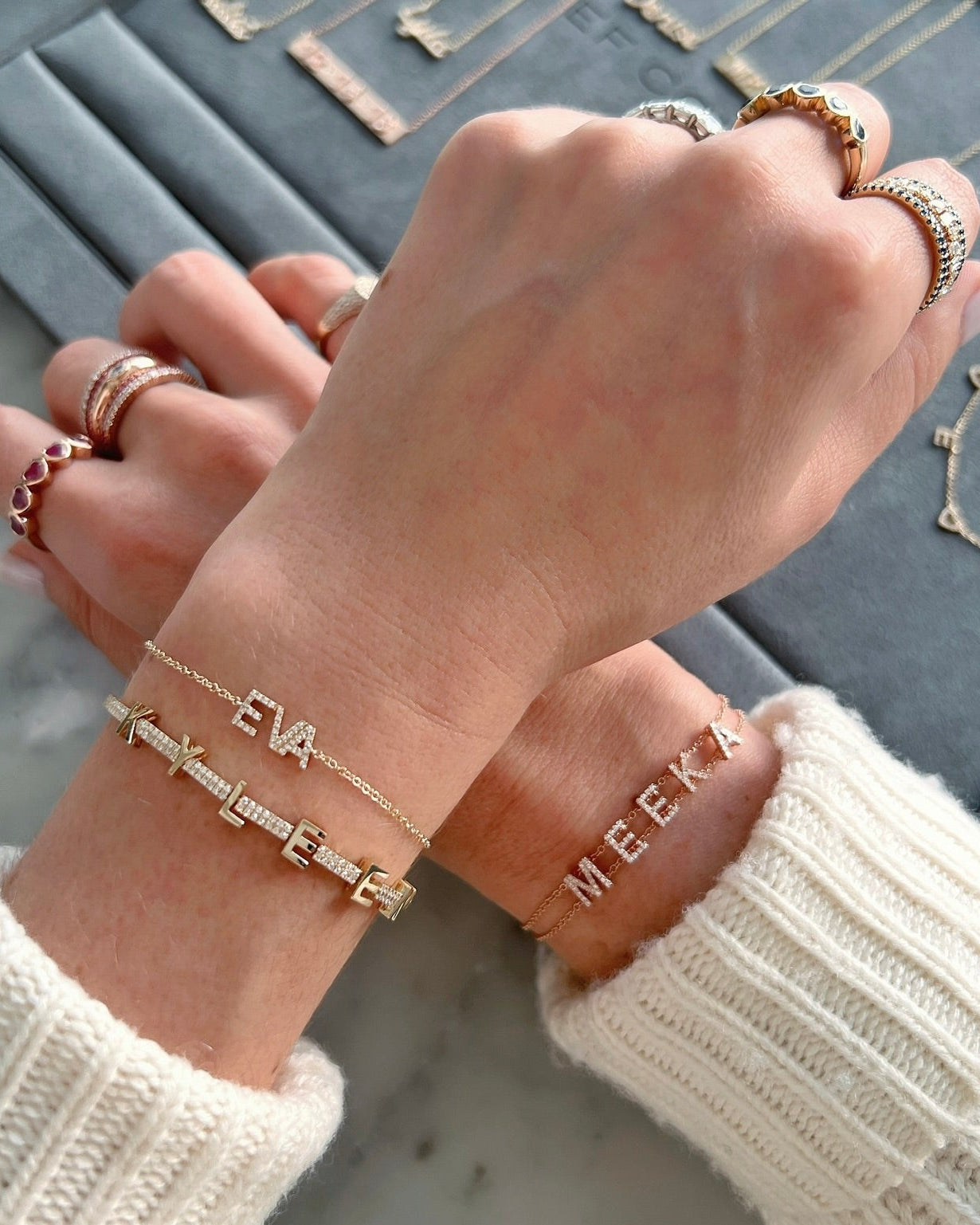 Diamond Custom Name Bracelet styled on the wrist in yellow gold