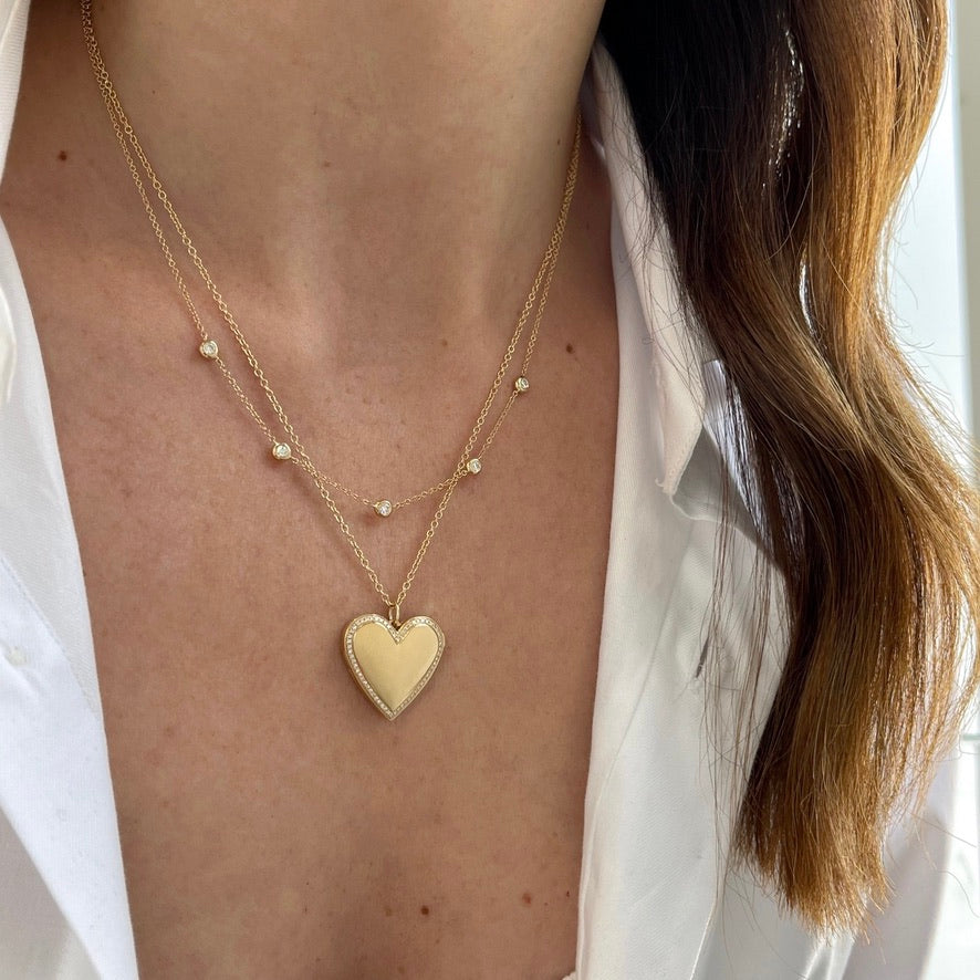 5 Diamond Pillow Necklace styled in yellow gold