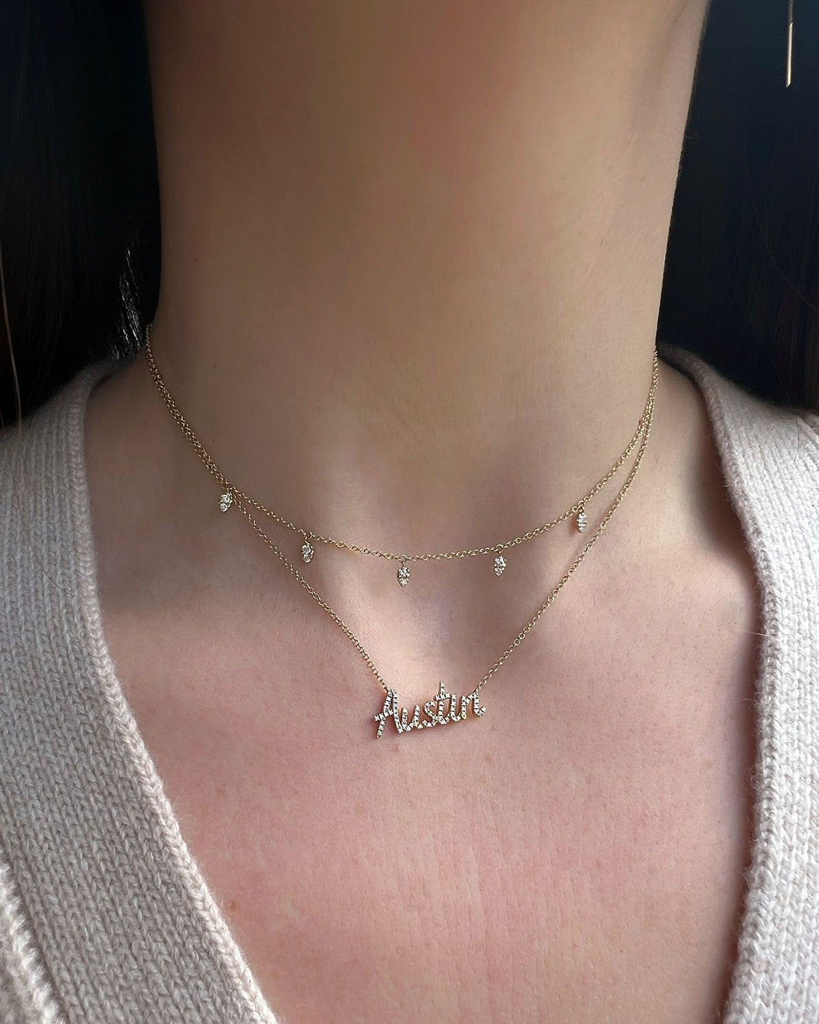 Diamond 5 Teardrop Choker Necklace in 14k yellow gold styled on neck of model with diamond script necklace with initials AUSTIN