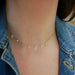 Diamond & White Quartz Ultimate Teardrop Necklace in 14k yellow gold styled on neck of model wearing denim jacket