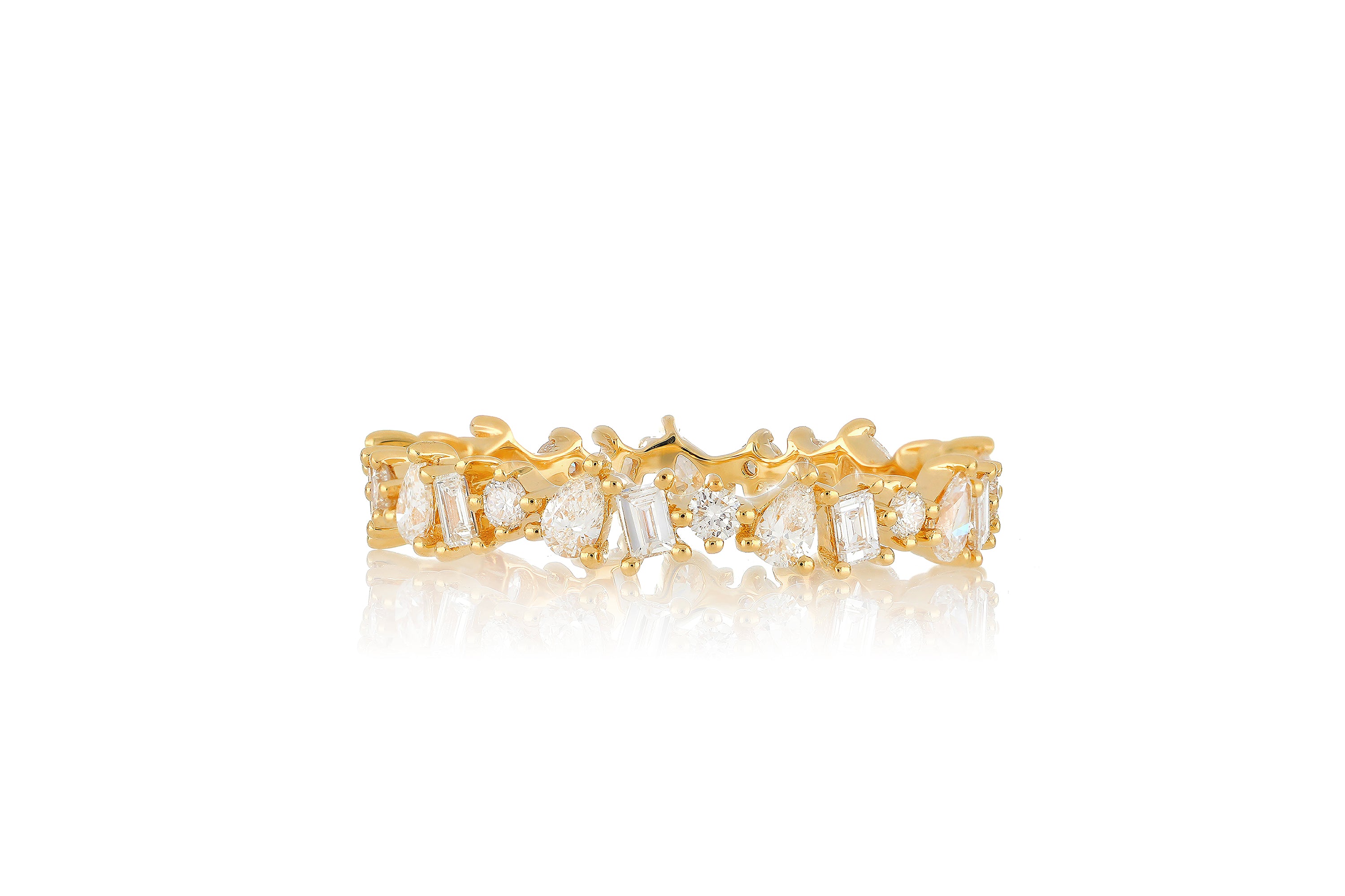 14k yellow gold multi faceted diamond ring with baguette diamonds, pear shaped diamonds, and round diamonds all around.