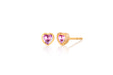 14k (karat) yellow gold heart-shaped stud earrings with pink sapphire jewels in the center. Finished with butterfly back posts.