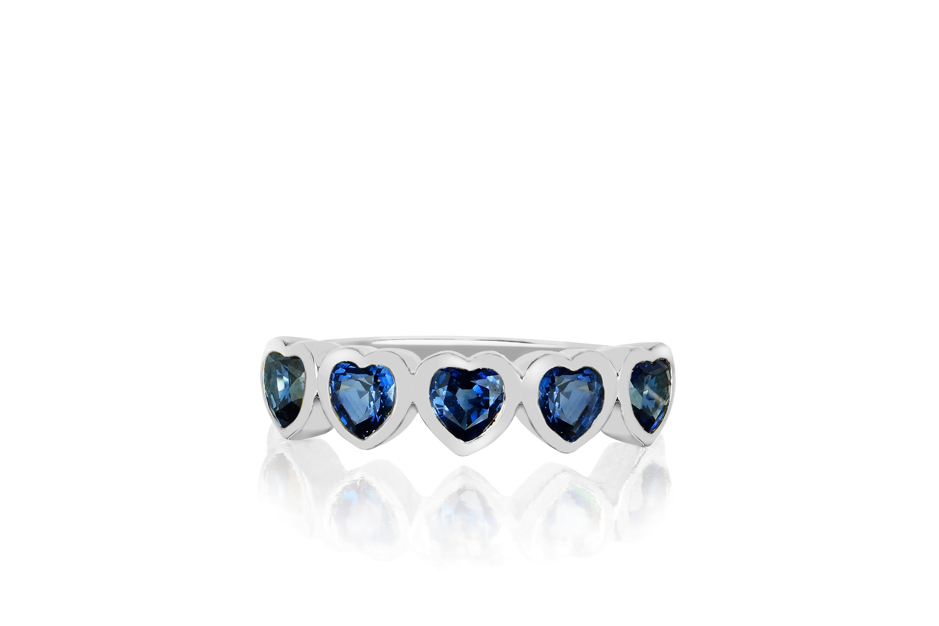 14k (karat) white gold ring with 5 blue sapphire jeweled hearts circling the top of the ring.