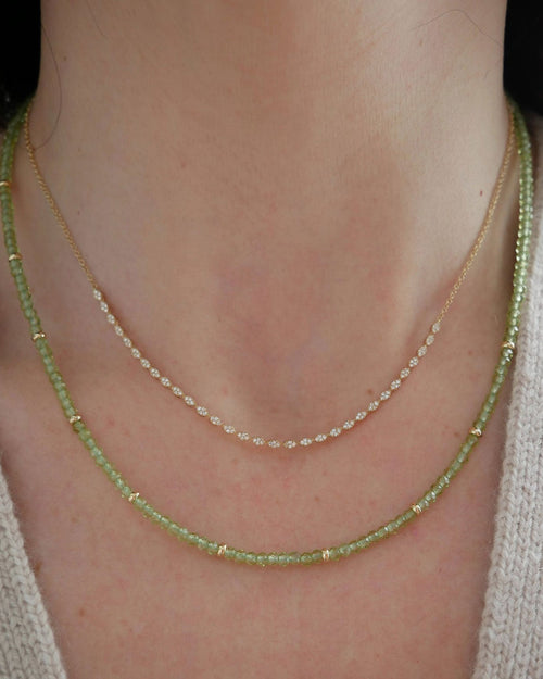 Birthstone Bead Necklace In Peridot styled on neck of model