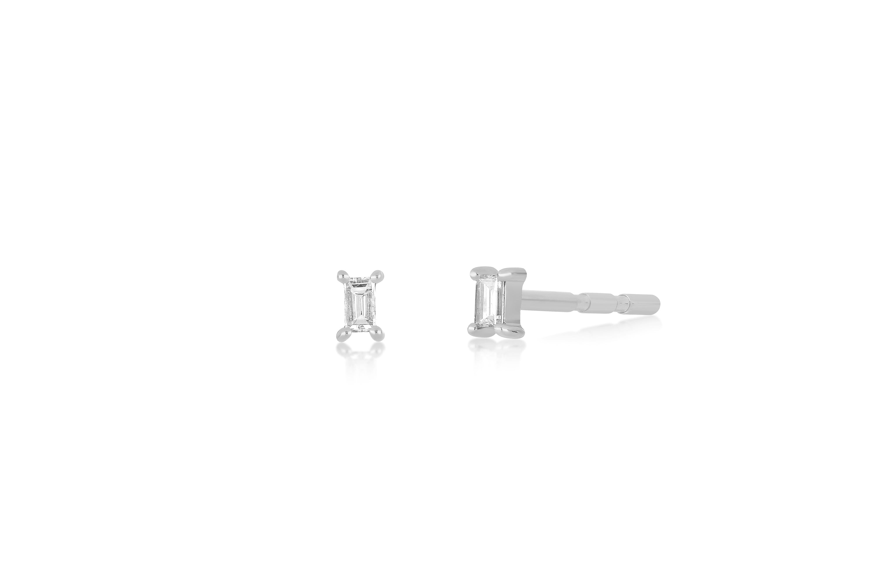 14k (karat) white gold diamond baguette stud earrings with butterfly post backs.