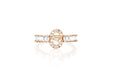 14k (karat) rose gold custom initial ring with baguette diamonds all around and diamonds filling the custom initial "S".