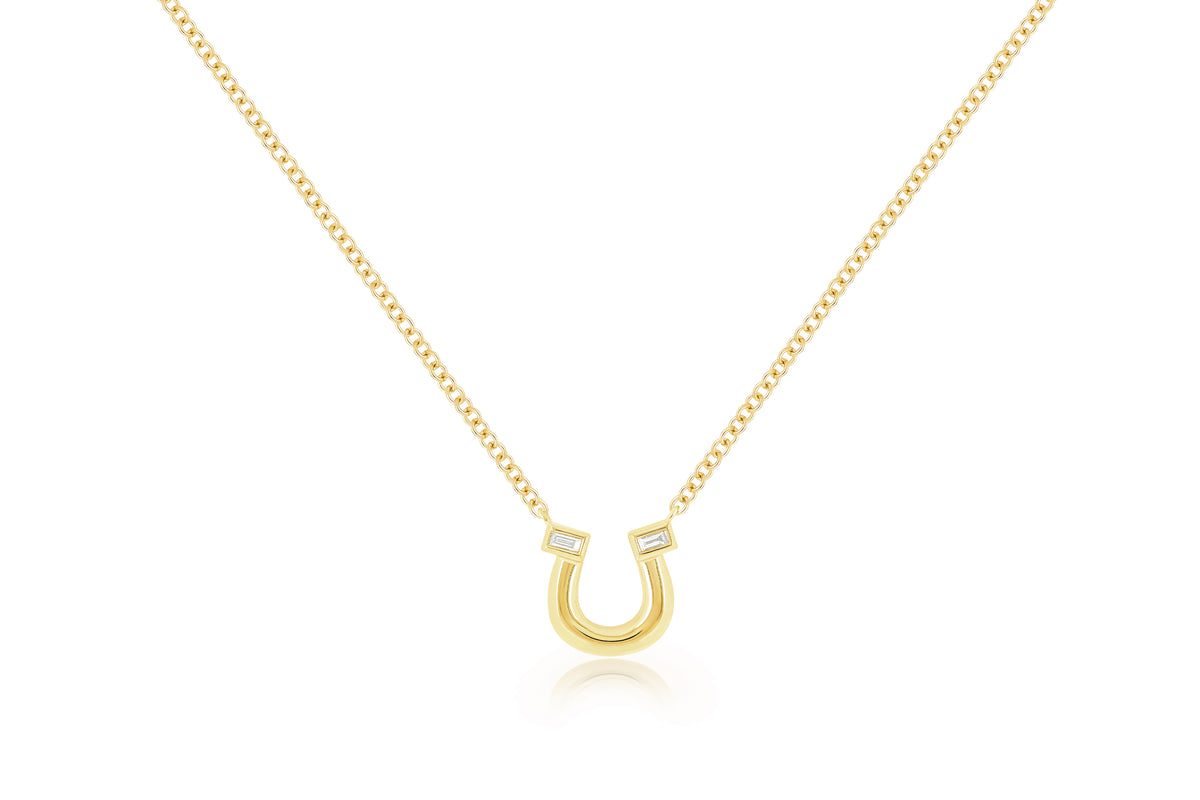 Yellow Gold Horseshoe Necklace with two Baguette Diamonds