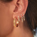 Multi Diamond Chain Stud Earring in 14k yellow gold styled in second and third earring hole of model with additional piercings