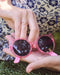 Evan's Sunnies Ring with Diamonds in 14k yellow gold styled on ring finger of model holding pink sunglasses in hands