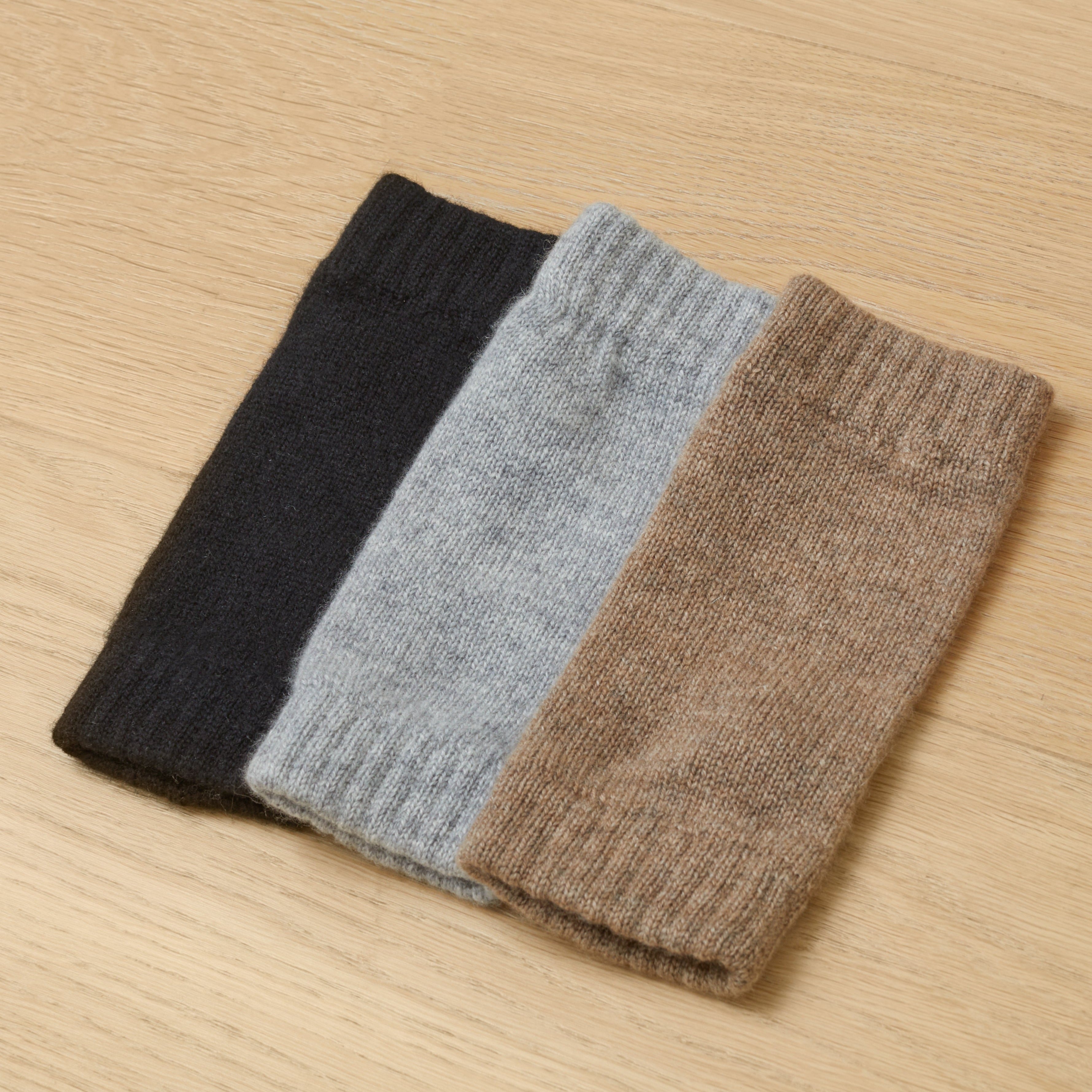 100% Cashmere Wrist Warmers in Black, Light Grey, and Mocha