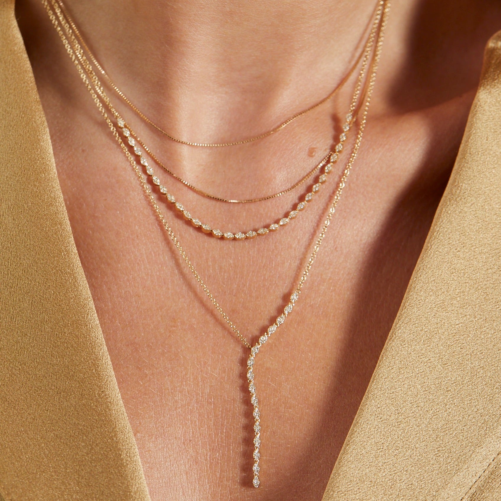 Pave Diamond Marquise Necklace styled on the neck in yellow gold