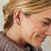 Gold Bar Threader Earring Styled on the Ear in yellow gold