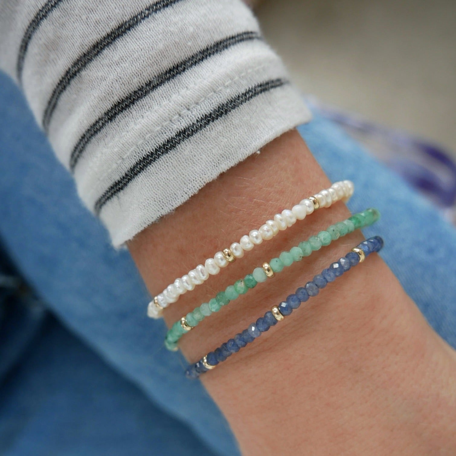 The Beaded Bracelet Gift Set - Pearl, Aquamarine, and Blue Sapphire Options Styled on Wrist