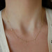 7 Baguette Diamond Necklace in yellow gold on the neck