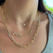 Jumbo Lola Chain Necklace And Triple Wrap Bracelet Styled on Neck of Model with Additional Necklaces to Show Length