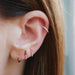 2 Tone Diamond Bar Stud Earring in 14k Yellow Gold Styled on Ear