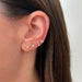 The Single Studs Gift Set in 14k Yellow Gold Styled on Ear of Model