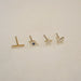 The Single Studs Gift Set in 14k Yellow Gold Laying Flat on Table
