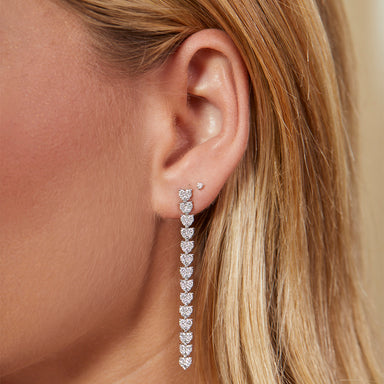 Endless Love Drop Earring styled on the ear in white gold