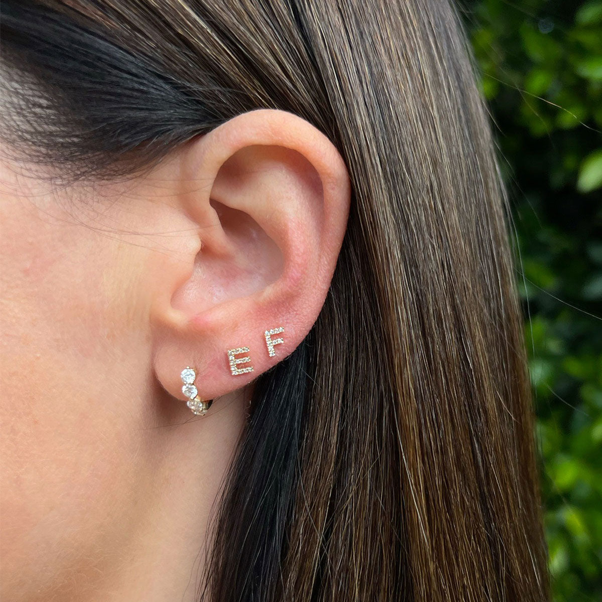 The Initial Set in 14k Yellow Gold Styled on Ear with E and F Initial Studs