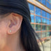 Clover Stud in 14k yellow gold styled on ear